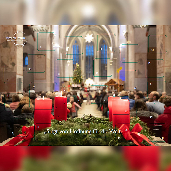 Auf dem Adventskalender der Ausbildungshilfe ist die Stiftskirche in Kaufungen im Advent abgebildet.